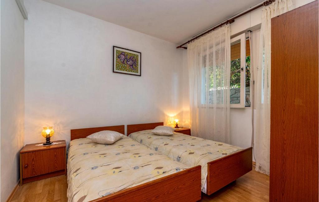 Posteľ alebo postele v izbe v ubytovaní Apartment Prizba - 03