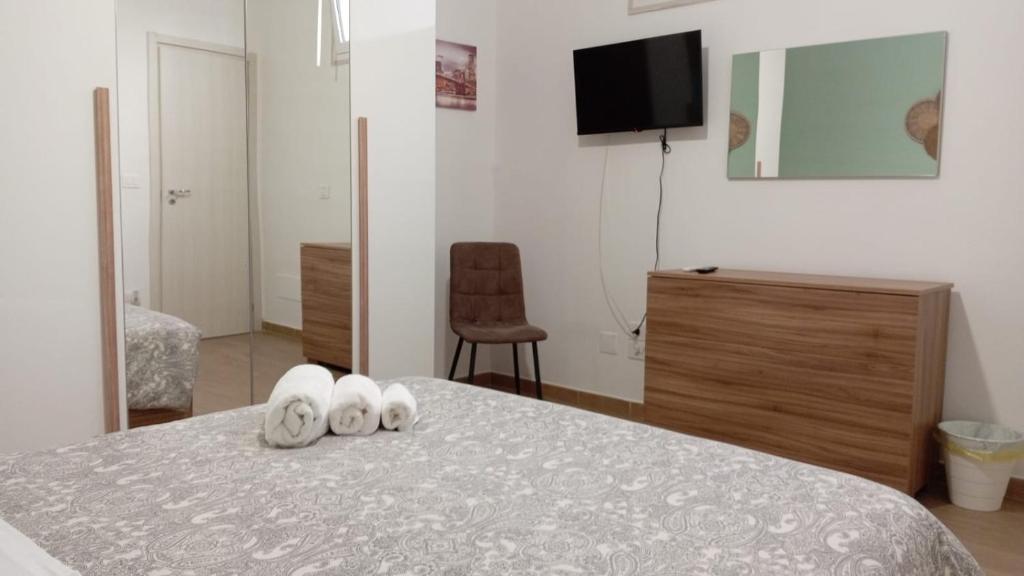 Postel nebo postele na pokoji v ubytování Home Sweet Home da Viky
