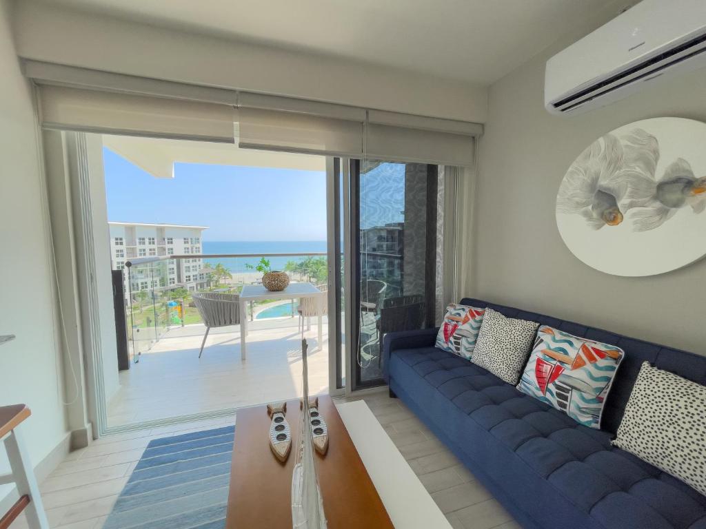 Posezení v ubytování Ventanas del Mar by Playa Caracol 3 Habitaciones