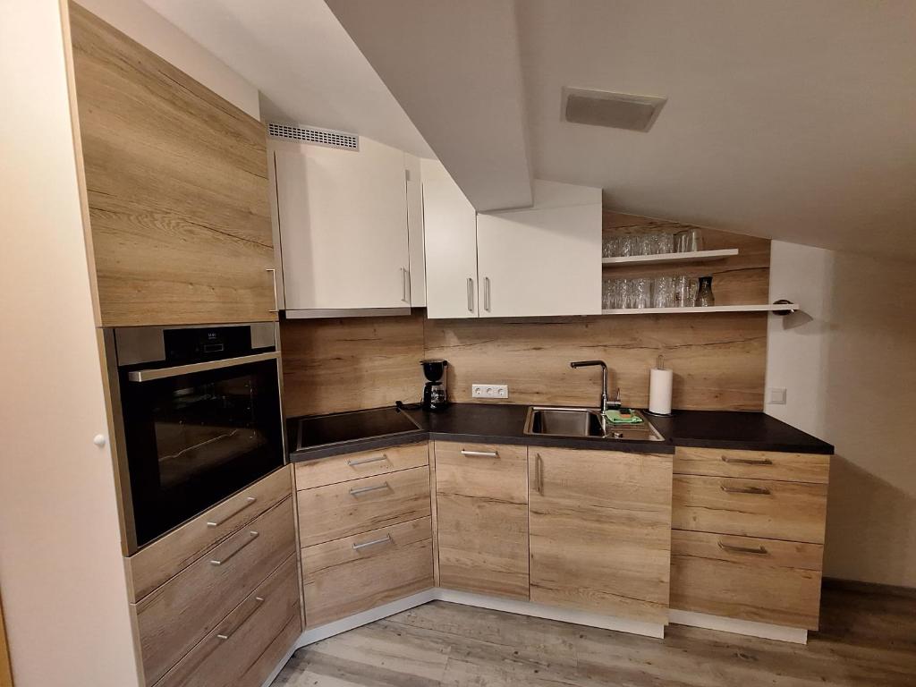 Kuchyň nebo kuchyňský kout v ubytování Appartements-Klaus