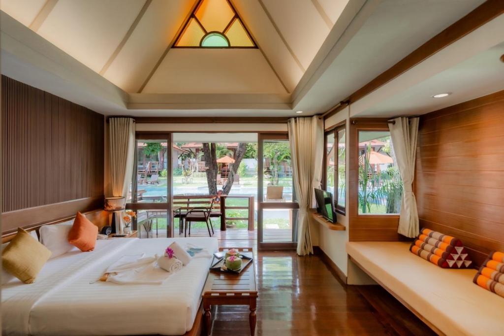 Postel nebo postele na pokoji v ubytování Baan Duangkaew Resort