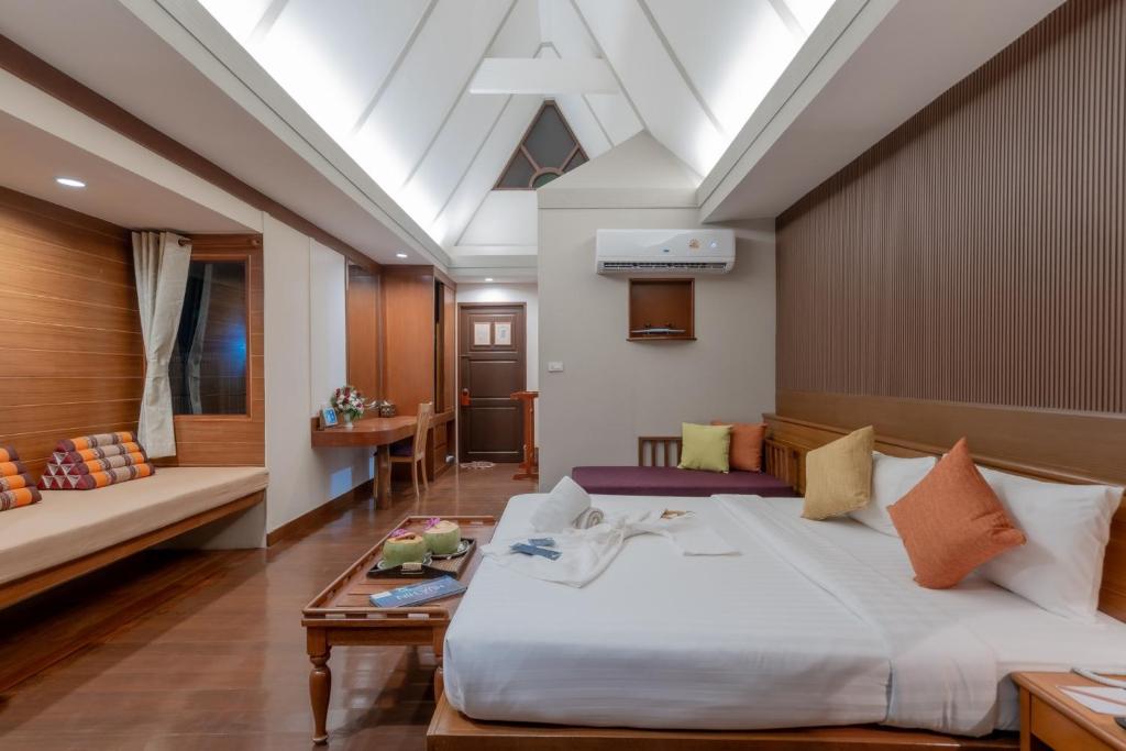 Postel nebo postele na pokoji v ubytování Baan Duangkaew Resort
