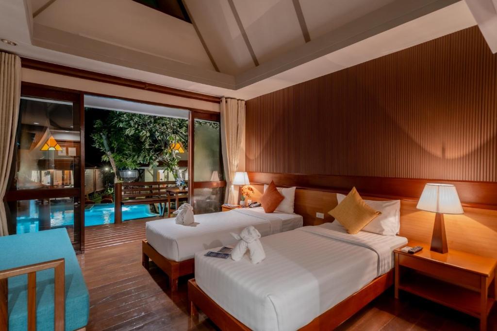 Postel nebo postele na pokoji v ubytování Baan Duangkaew Resort