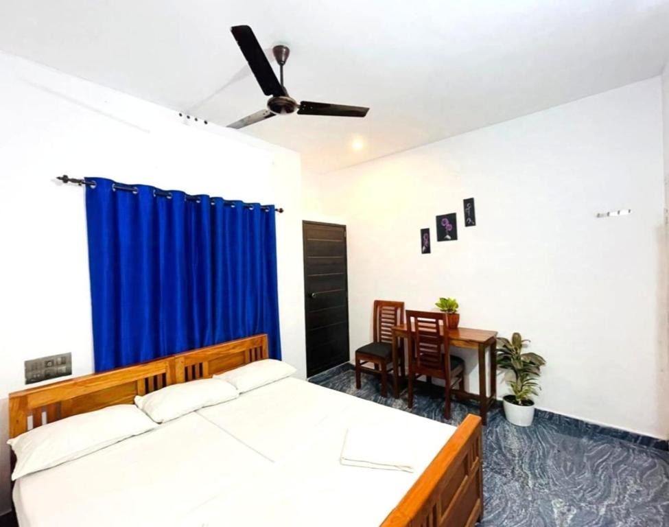 Postel nebo postele na pokoji v ubytování Raelyn's Homestay