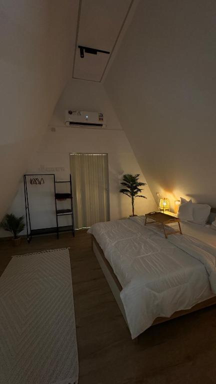 Postel nebo postele na pokoji v ubytování sandhut77