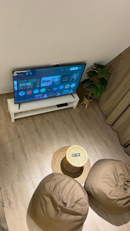 TV a/nebo společenská místnost v ubytování sandhut77