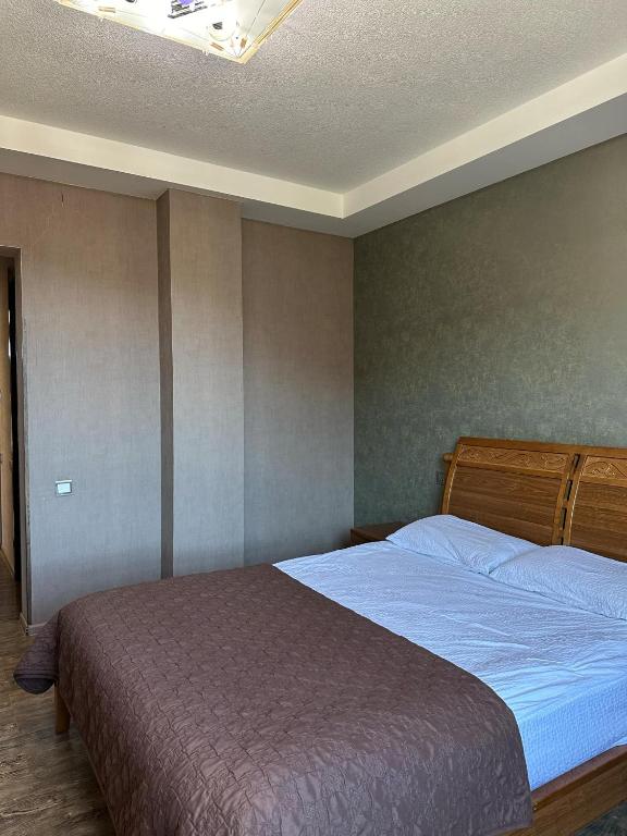 Postel nebo postele na pokoji v ubytování Hotel in Bakuriani