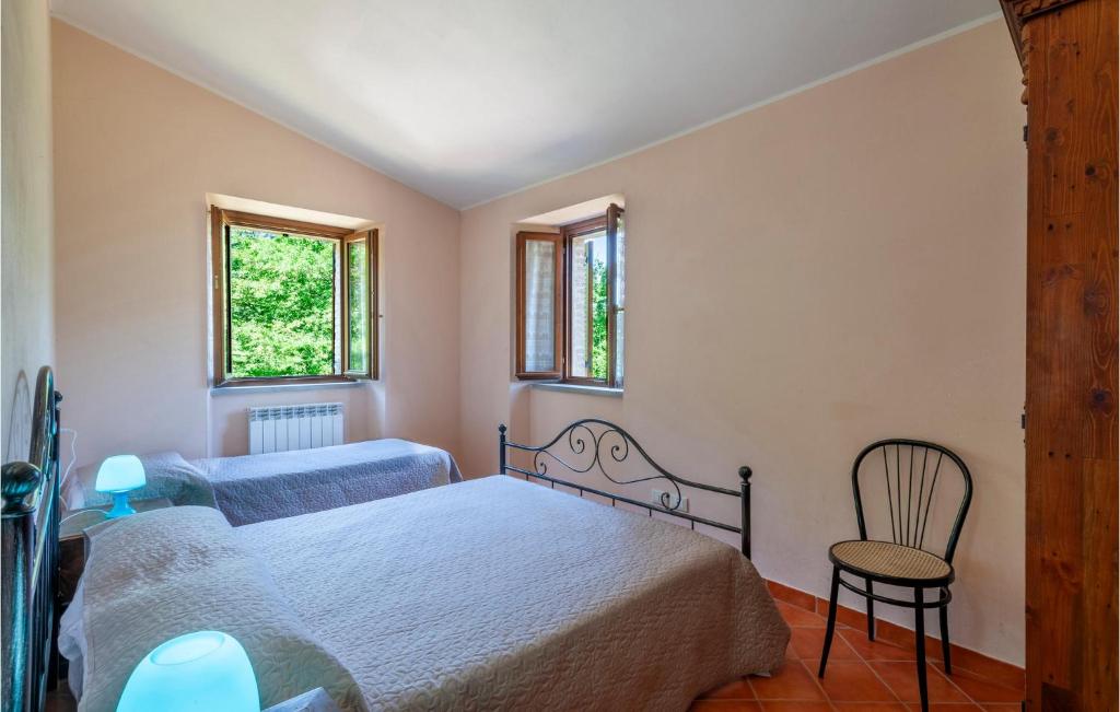 A bed or beds in a room at Valguerriera - Rosa Bianca