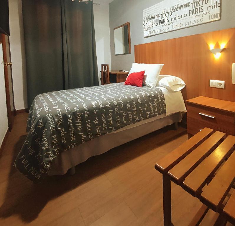 Postel nebo postele na pokoji v ubytování Hostal San Francisco