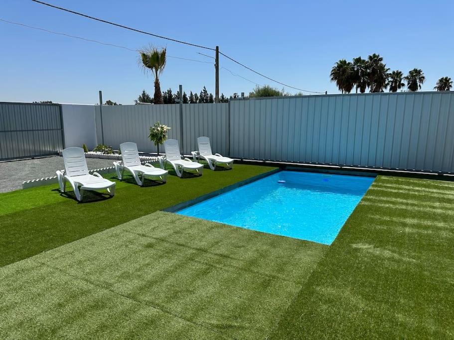 Πισίνα στο ή κοντά στο Casa de campo con piscina climatizada