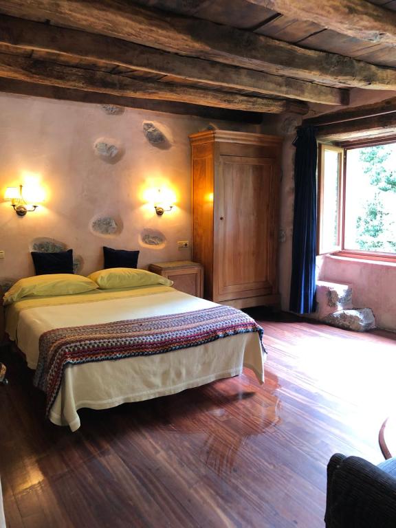 Postel nebo postele na pokoji v ubytování Casa Rural Ecológica Kaaño Etxea