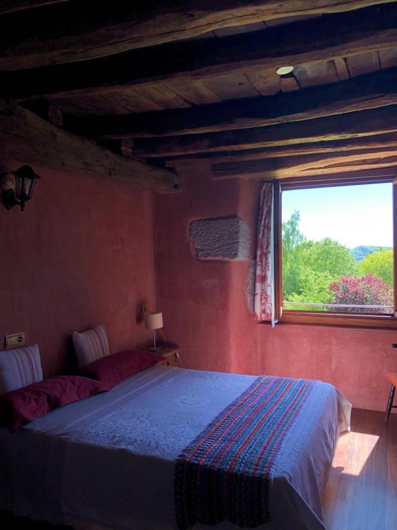 Postel nebo postele na pokoji v ubytování Casa Rural Ecológica Kaaño Etxea