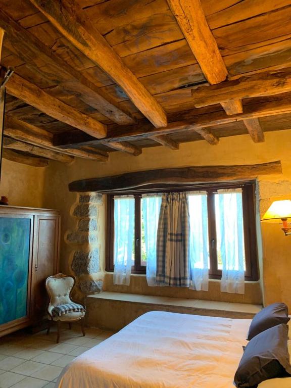 Postel nebo postele na pokoji v ubytování Casa Rural Ecológica Kaaño Etxea