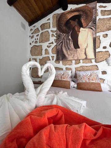 Postel nebo postele na pokoji v ubytování Hacienda de las Indias, Cartagena