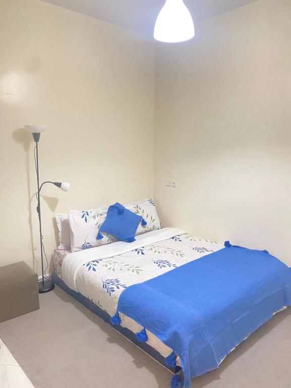 Postel nebo postele na pokoji v ubytování Dakhla sky blue