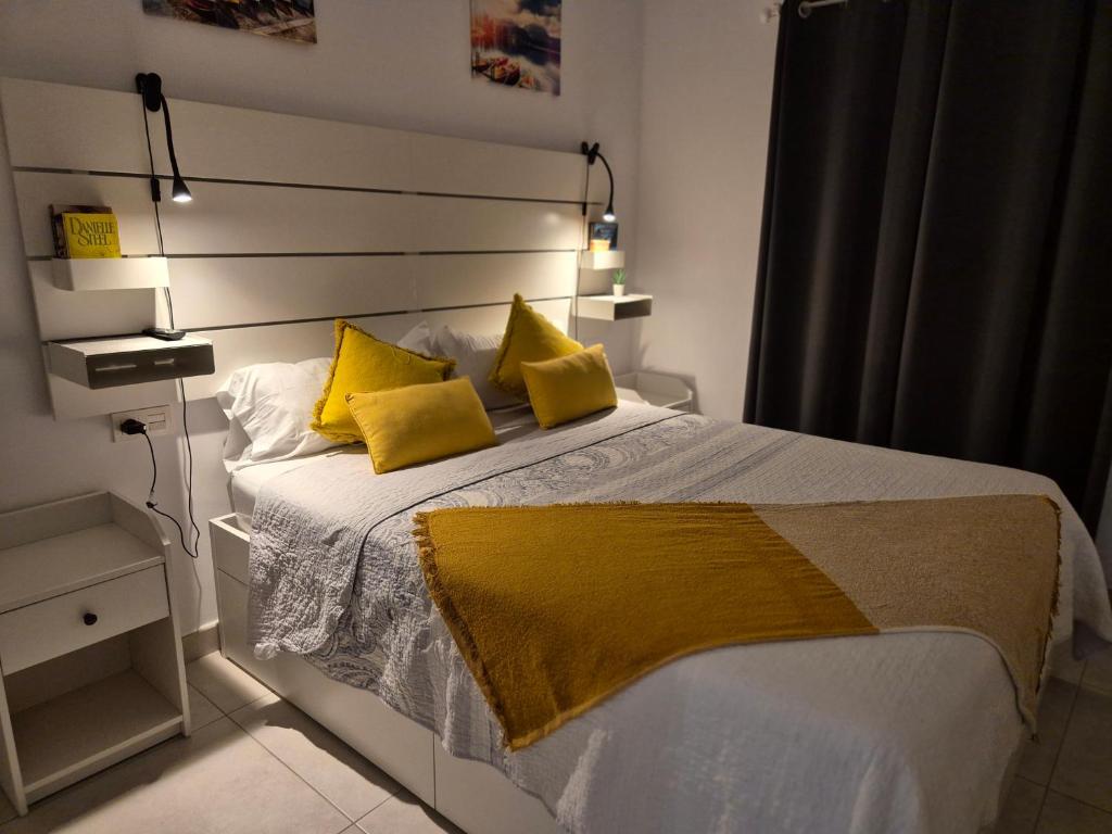 Postel nebo postele na pokoji v ubytování White Suite Deluxe