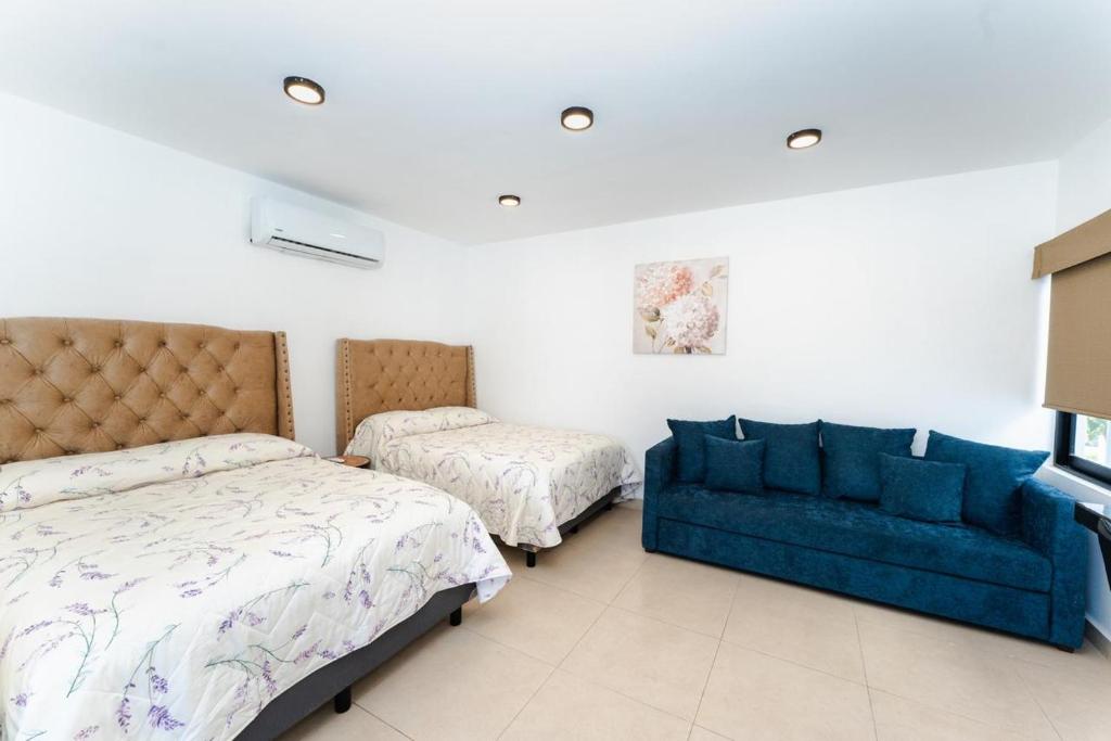 Postel nebo postele na pokoji v ubytování Apartamentos Torre II Condominios - Pet Friendly
