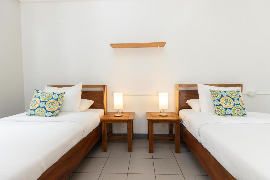 Postel nebo postele na pokoji v ubytování Alma Vida Hotel