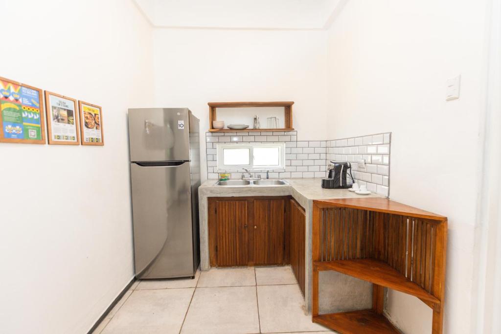 Kuchyň nebo kuchyňský kout v ubytování Alma Vida Hotel