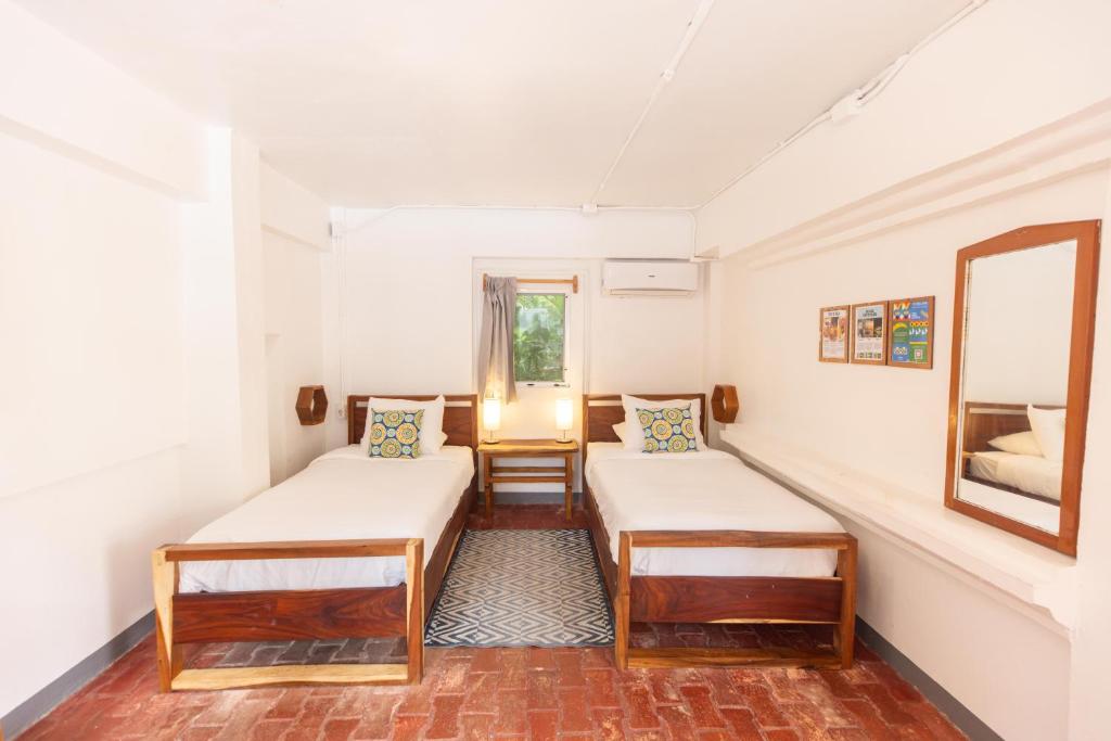 Postel nebo postele na pokoji v ubytování Alma Vida Hotel
