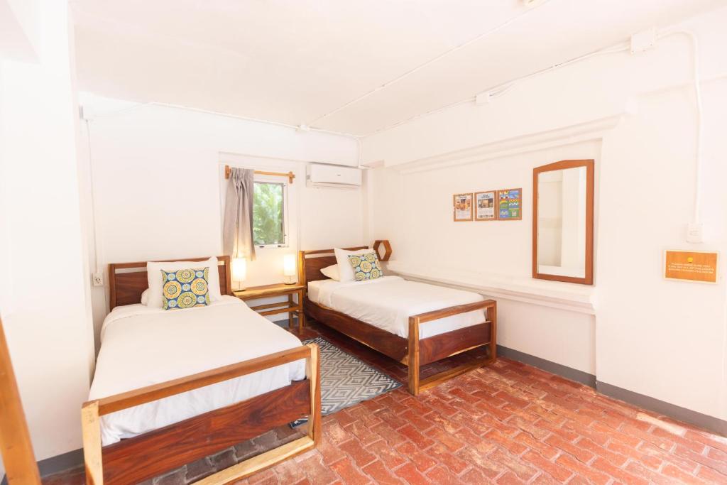 Postel nebo postele na pokoji v ubytování Alma Vida Hotel