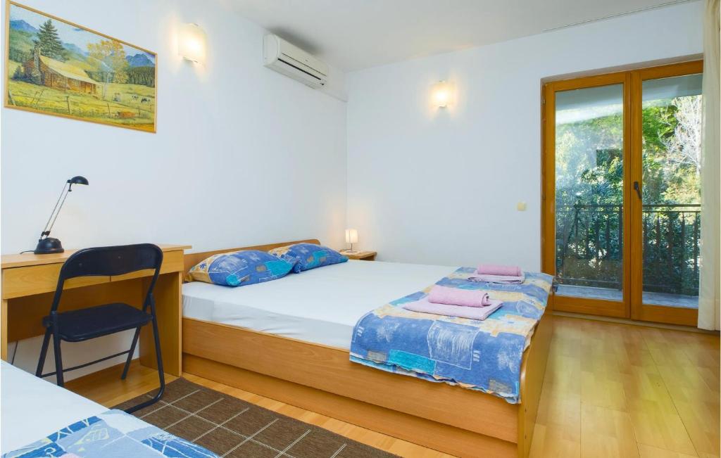 Posteľ alebo postele v izbe v ubytovaní Apartment Duce Luka Iv
