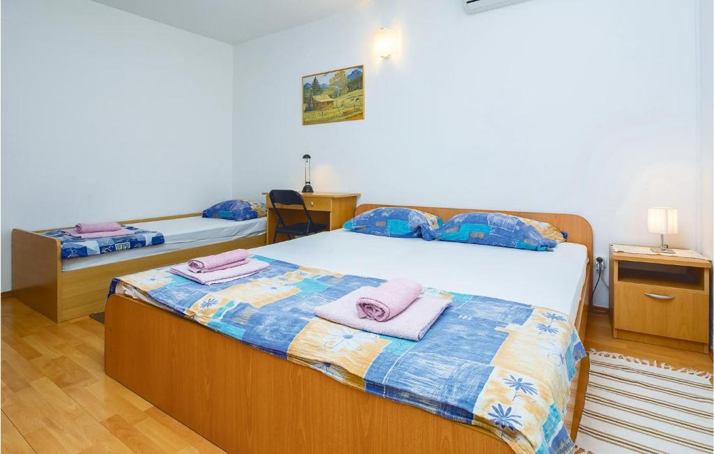 Posteľ alebo postele v izbe v ubytovaní Apartment Duce Luka Iv