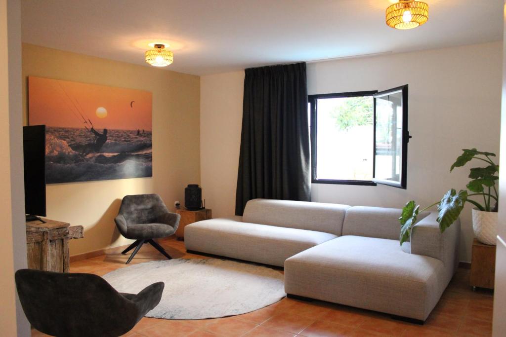 Een zitgedeelte bij Villa Casa Senna