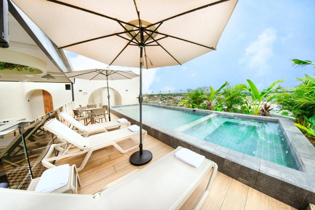Bazén v ubytování Botanico Hotel y Spa nebo v jeho okolí