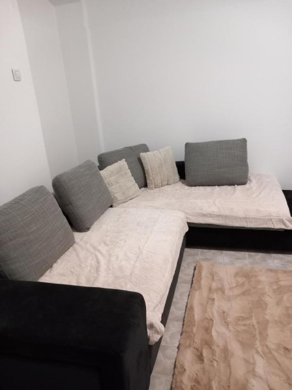 Ένα ή περισσότερα κρεβάτια σε δωμάτιο στο Central apartament