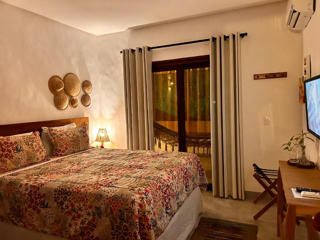 Postel nebo postele na pokoji v ubytování Maruê Guesthouse Porto de Pedras