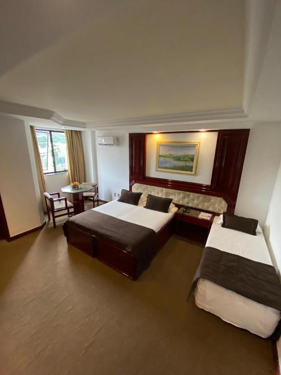 Maxim Plaza Hotel - Triple Chambre (1 Lit Double + 1 Lit Simple)