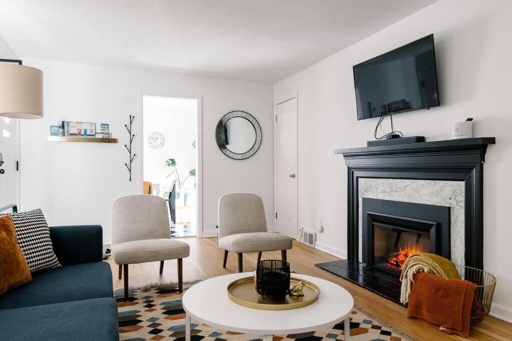 a living room with a couch and a fireplace at Cuyahoga Valley NP, Dog Friendly, Boston Mills Ski in Brecksville