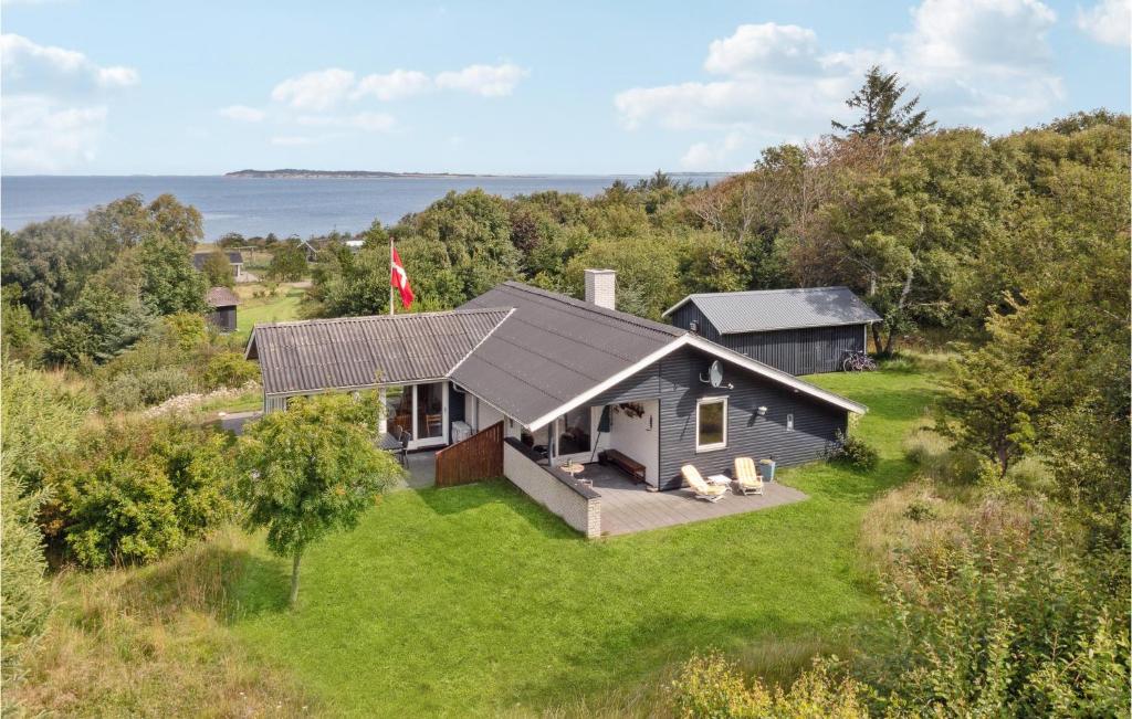 an aerial view of a small house on a hill at Three-Bedroom Holiday Home In Fur in Fur
