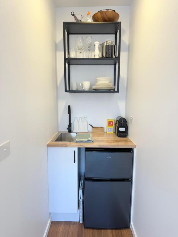 Kuchyň nebo kuchyňský kout v ubytování Torquay Boutique Guesthouse