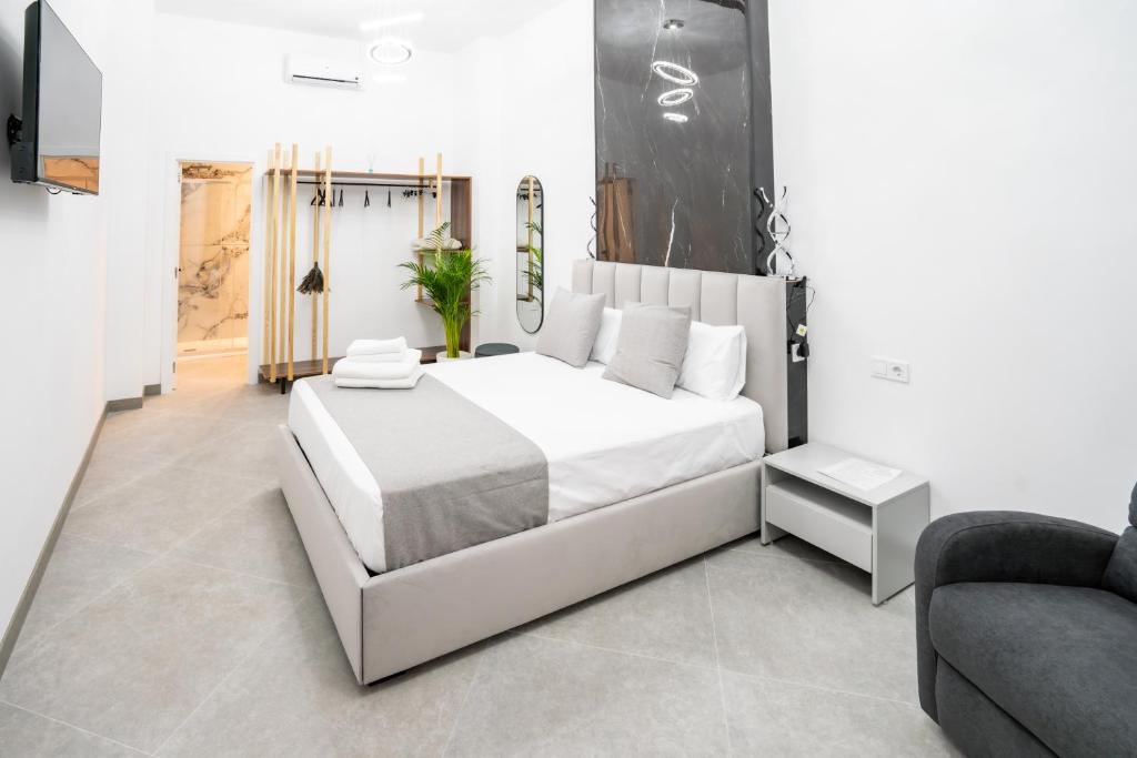 Ένα ή περισσότερα κρεβάτια σε δωμάτιο στο Casa Luxore