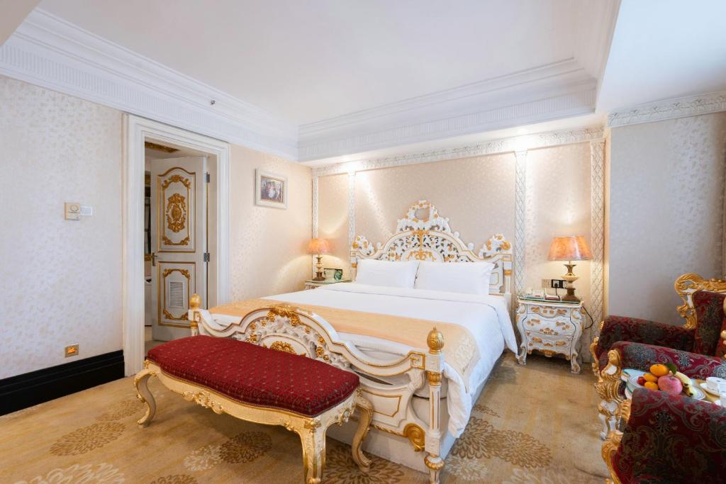 Postel nebo postele na pokoji v ubytování Nanyang King's Gate Hotel--Free Shuttle Service to Canton Fair