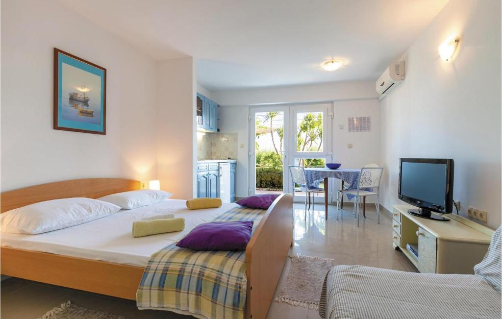 Postel nebo postele na pokoji v ubytování Holiday Home Grljevacka Vi