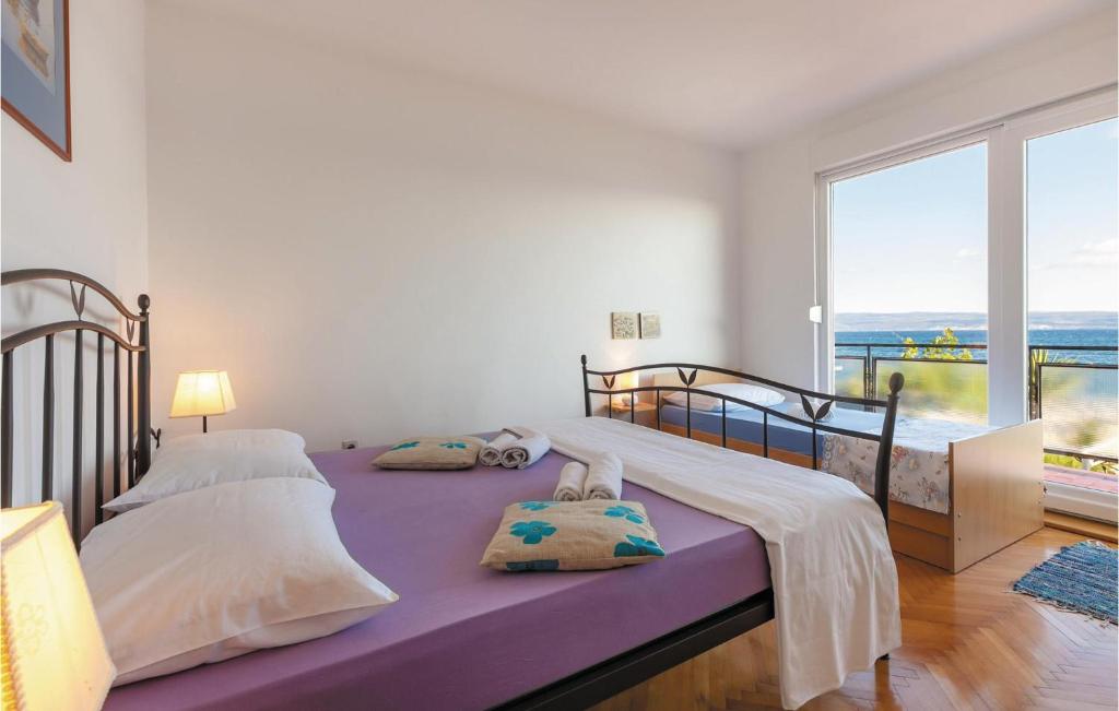 Postel nebo postele na pokoji v ubytování Holiday Home Grljevacka Vi