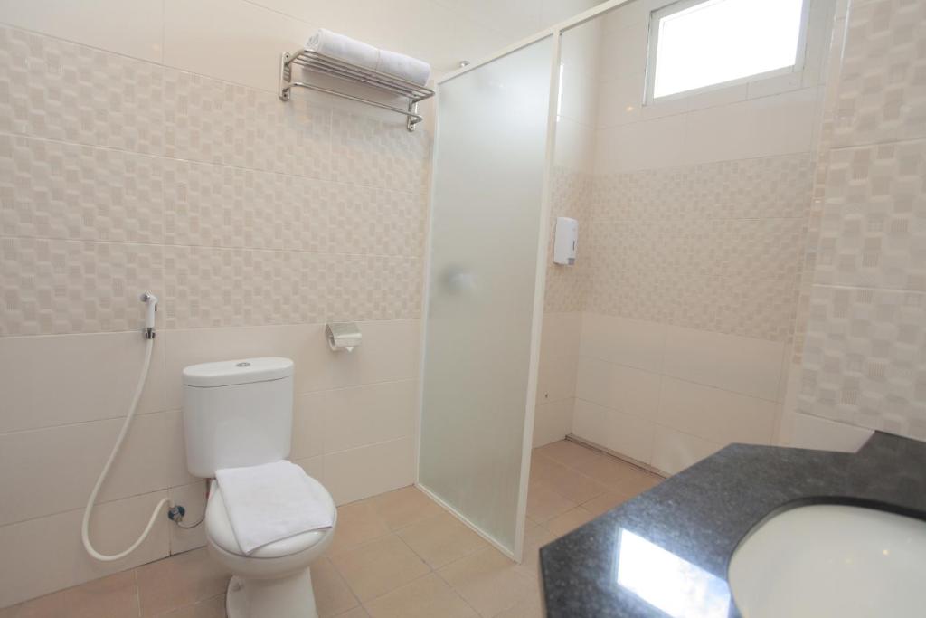 Koupelna v ubytování Prima SR Hotel & Convention Yogyakarta