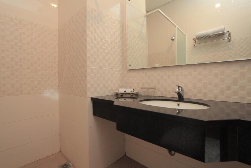 Koupelna v ubytování Prima SR Hotel & Convention Yogyakarta