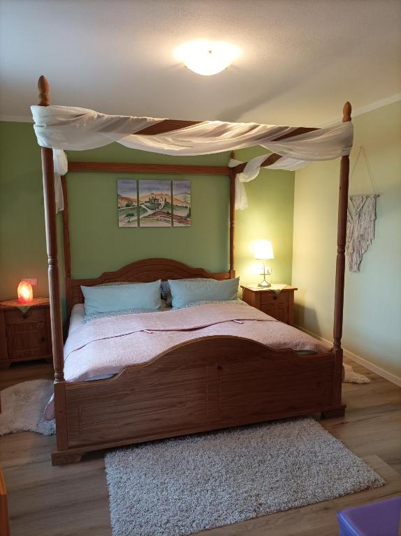 Postel nebo postele na pokoji v ubytování Ferienwohnung Ilona, Armin & Simon Funke