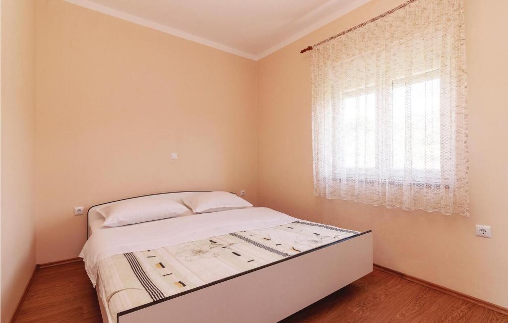 Posteľ alebo postele v izbe v ubytovaní Apartment Ribnica-Krusevo With Sea View Ix