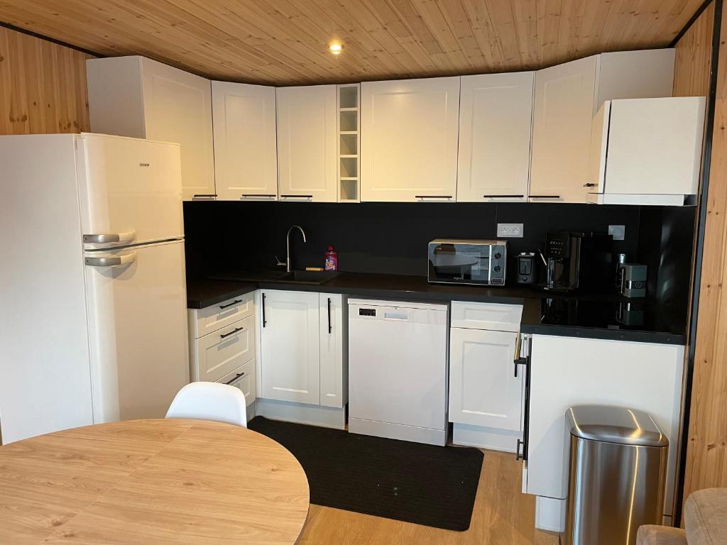Kuchyň nebo kuchyňský kout v ubytování Le Chalet d'Amélia