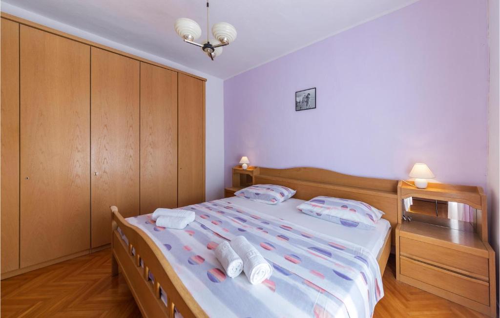 Posteľ alebo postele v izbe v ubytovaní Apartment Valtura 13