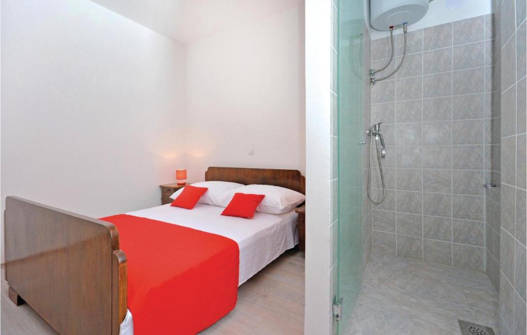 Postel nebo postele na pokoji v ubytování Apartment Srinjine I