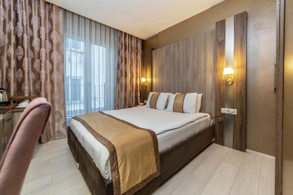 Royal Capital Hotel Bursaにあるベッド