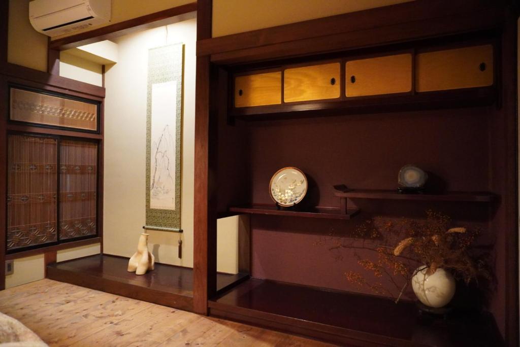 Postel nebo postele na pokoji v ubytování 城下町の一棟貸し 今来 Konrai - Private-use guesthouse