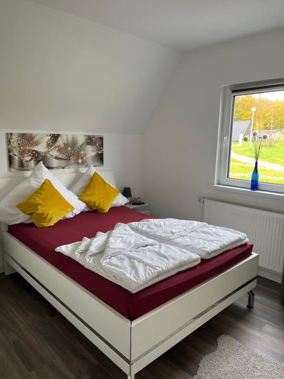 Postel nebo postele na pokoji v ubytování Ferienhaus Joschko