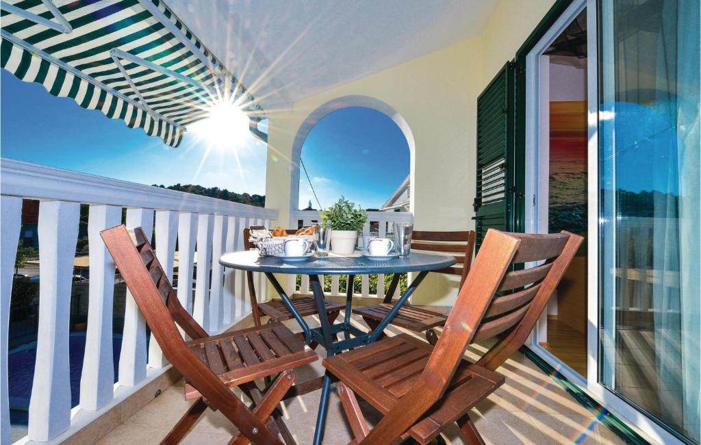 Balkón nebo terasa v ubytování Holiday Home Murter 44 With Outdoor Swimmingpool